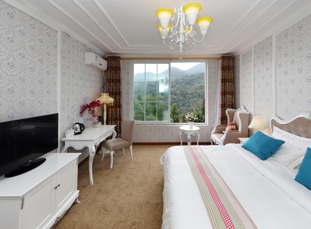Panshan Tingquan Tuwo Holiday Resort Лешань Номер фото