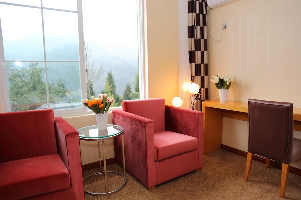 Panshan Tingquan Tuwo Holiday Resort Лешань Номер фото