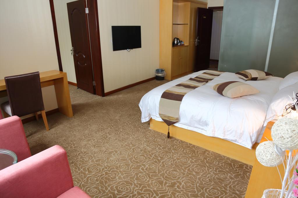 Panshan Tingquan Tuwo Holiday Resort Лешань Номер фото