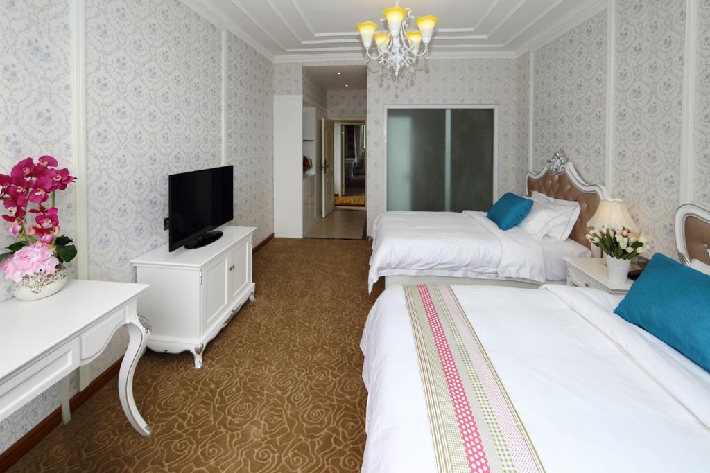 Panshan Tingquan Tuwo Holiday Resort Лешань Номер фото