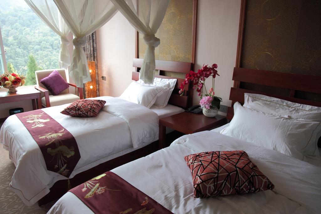 Panshan Tingquan Tuwo Holiday Resort Лешань Номер фото
