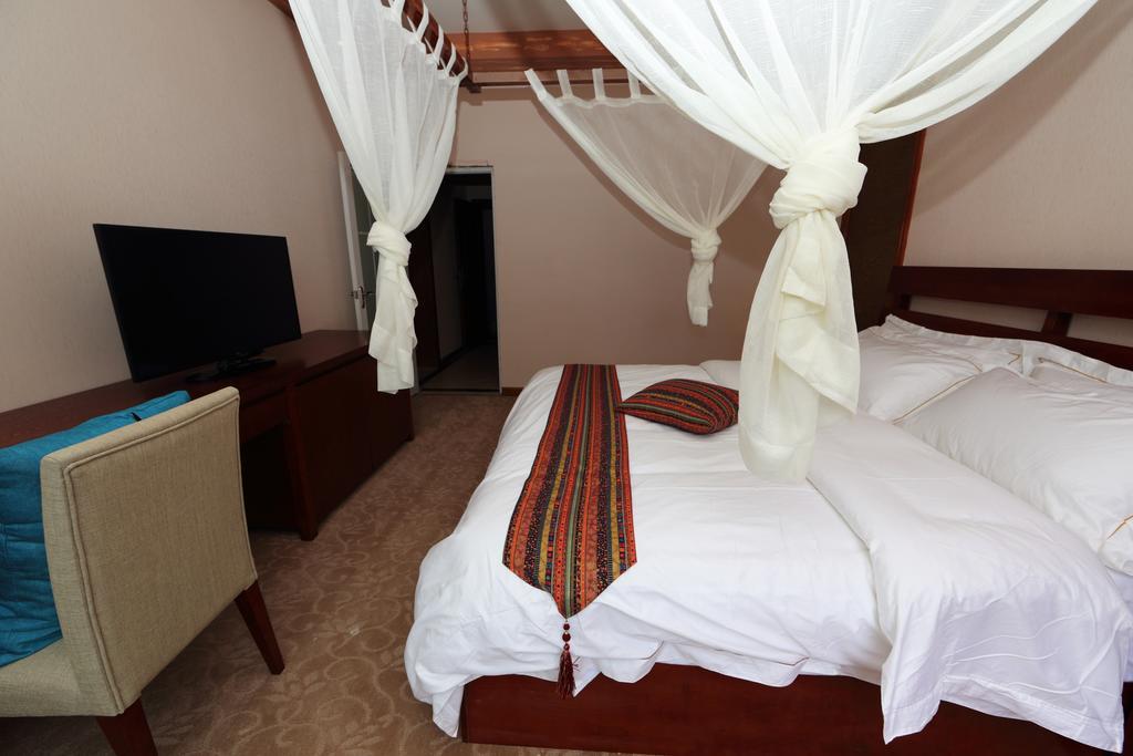 Panshan Tingquan Tuwo Holiday Resort Лешань Номер фото