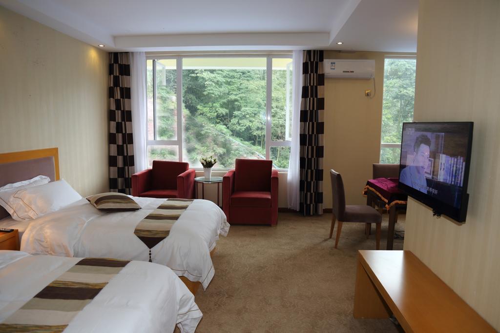 Panshan Tingquan Tuwo Holiday Resort Лешань Номер фото