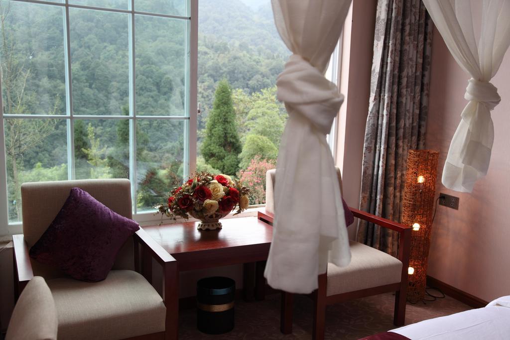 Panshan Tingquan Tuwo Holiday Resort Лешань Номер фото