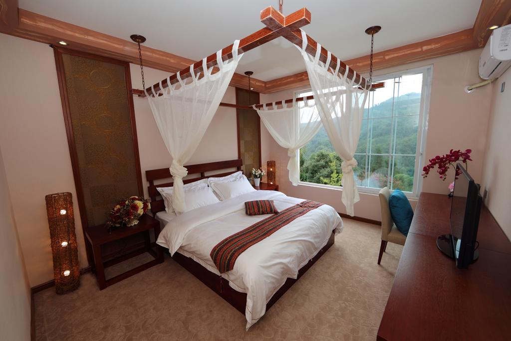 Panshan Tingquan Tuwo Holiday Resort Лешань Номер фото