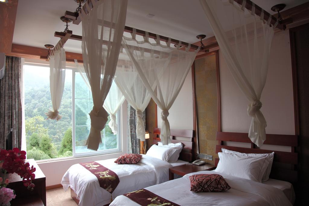 Panshan Tingquan Tuwo Holiday Resort Лешань Номер фото