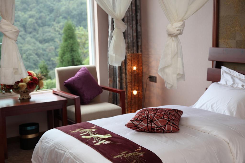 Panshan Tingquan Tuwo Holiday Resort Лешань Номер фото