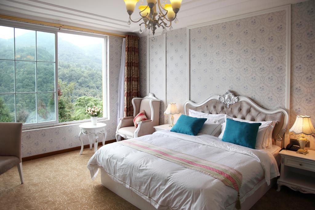 Panshan Tingquan Tuwo Holiday Resort Лешань Номер фото