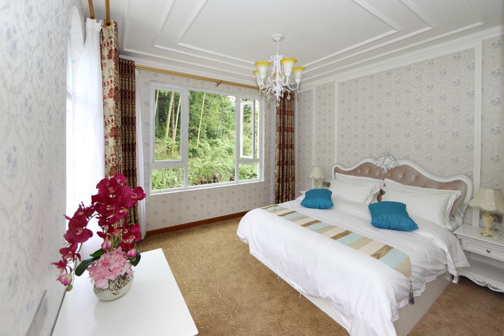 Panshan Tingquan Tuwo Holiday Resort Лешань Номер фото