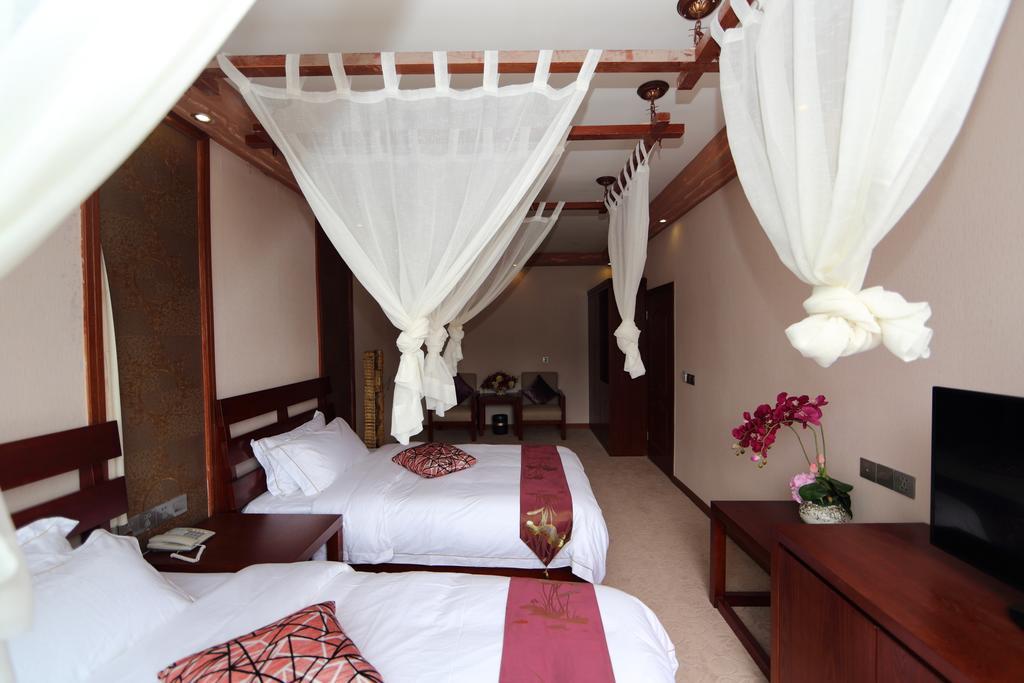 Panshan Tingquan Tuwo Holiday Resort Лешань Номер фото