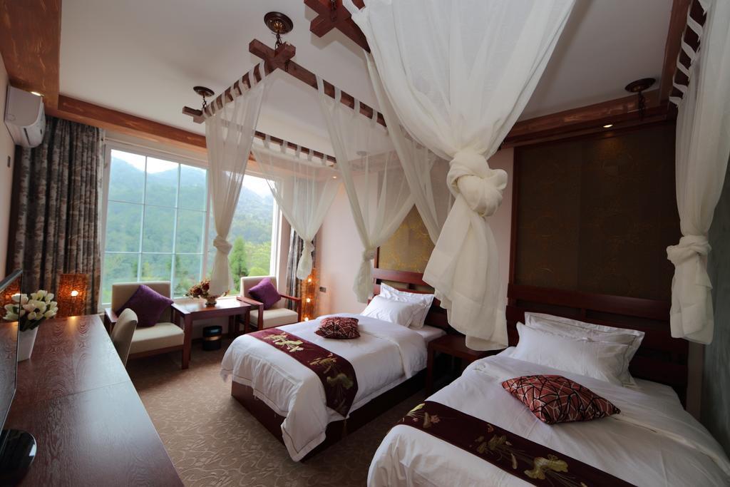 Panshan Tingquan Tuwo Holiday Resort Лешань Номер фото