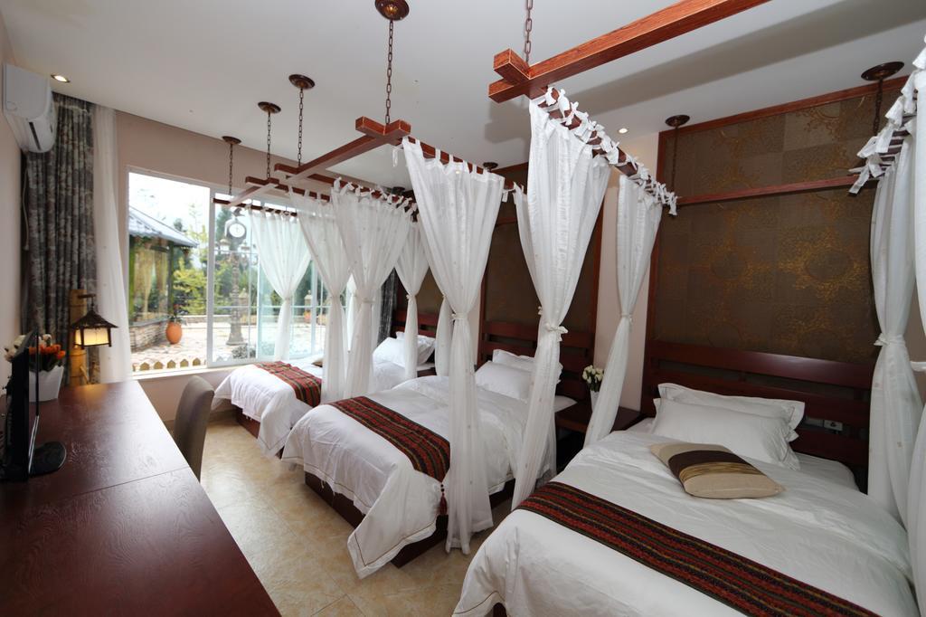 Panshan Tingquan Tuwo Holiday Resort Лешань Номер фото