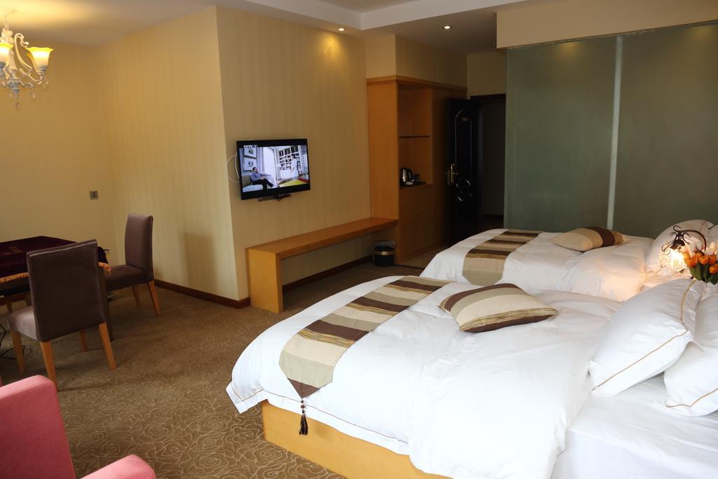 Panshan Tingquan Tuwo Holiday Resort Лешань Номер фото