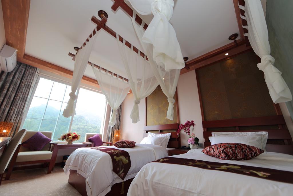 Panshan Tingquan Tuwo Holiday Resort Лешань Номер фото