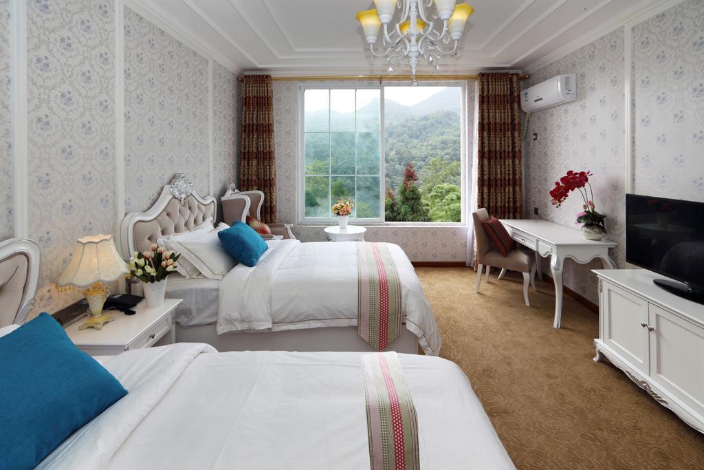 Panshan Tingquan Tuwo Holiday Resort Лешань Номер фото