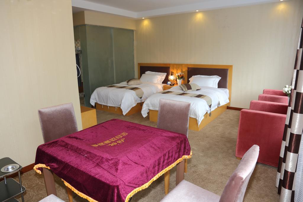 Panshan Tingquan Tuwo Holiday Resort Лешань Номер фото